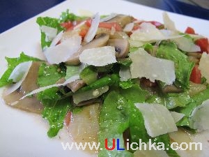 Salad. Salad with mushrooms, peppers and parmesan cheese.