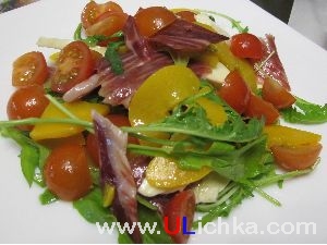 Salad. Salad with peach, mozzarella cheese and jamon.