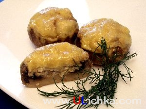 Vegetable Dishes. Mushrooms with cheese and sesame seeds.