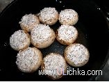 Vegetable Dishes. Mushrooms with cheese and sesame seeds.